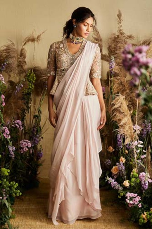 8. Modern draping with peplum saree